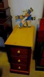 Side table w/ drawers, sitting underneath R.A. Miller whirligig