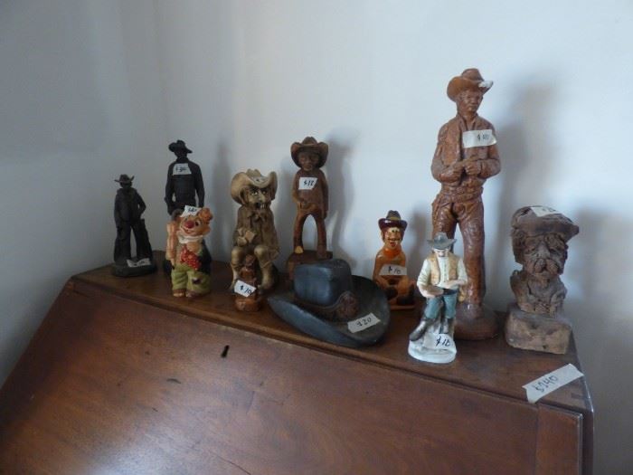 Cowboy statues.
