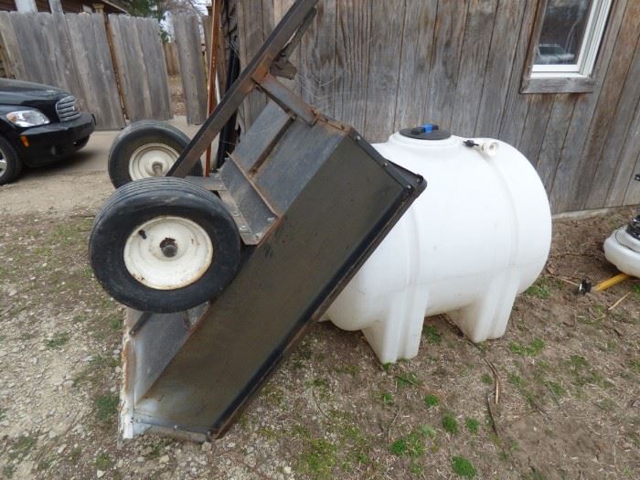 Water tank and trailer.