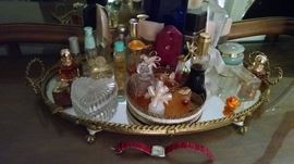 perfume bottles , vanity mirror