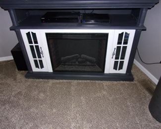 Gray fireplace TV/Entertainment Stand
