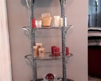 Beautiful metal shelving with glass shelves and wood base with drawer. Unique!