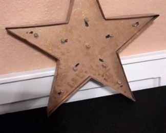 Lighted star wall hanging.