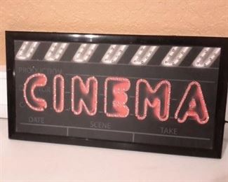 Lighted "Cinema" sign.