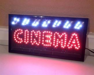 Lighted "Cinema" sign.