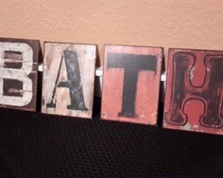 Metal BATH letters.