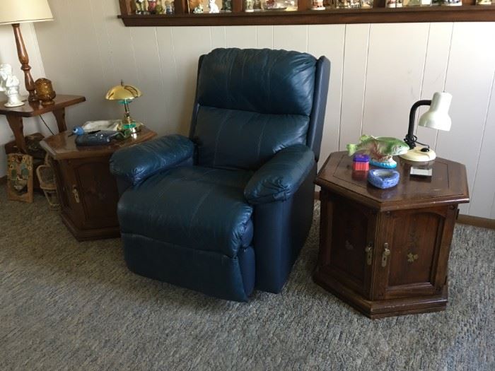 Blue leather recliner; end tables