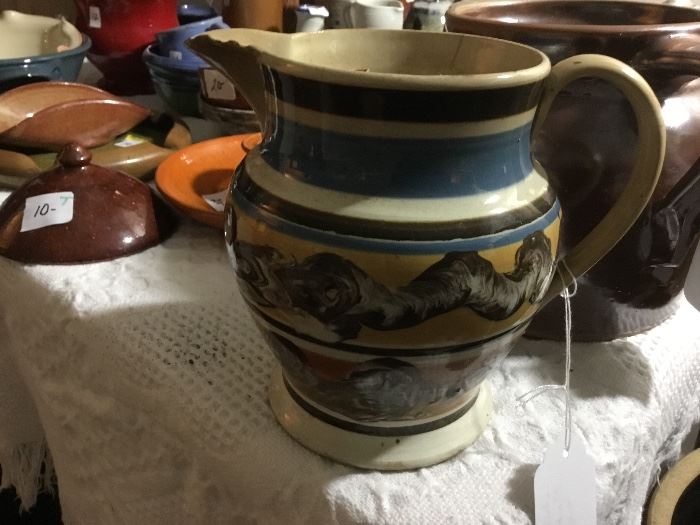 Antique mocha ware pitcher. Wormwood firing