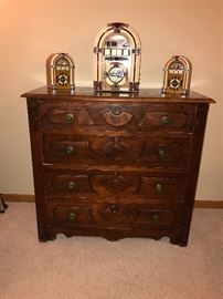 Antique Chest of Drawers with vintage like stereo and speakers