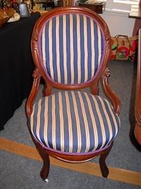 PAIR ROUND BOTTOM AND BACK CHAIR WITH PORCELAIN CASTERS