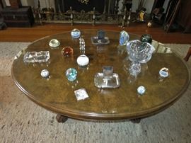 Victorian Burled Walnut Oval Coffee Table; Collection of Glass Paperweights; Baccarat Ashtray (on the left)