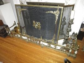 Antique Fireplace Screen; Antique Brass / Porcelain  Fender; Antique Andirons; Graduated Pair of Antique Gilt Prickets 