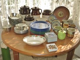 Cool Jugs; Retro Pottery, French Pans; Pewter Plates, etc.  on a Round Drop-Leaf Pine Table