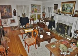 Living Room Packed with the contents of Two Residences.