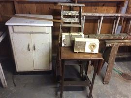 Cabinets and old typewriter table
