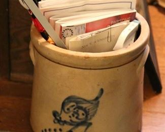 Chicken pecking blue decorated crock.