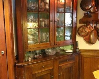 Very fine step back corner cupboard.