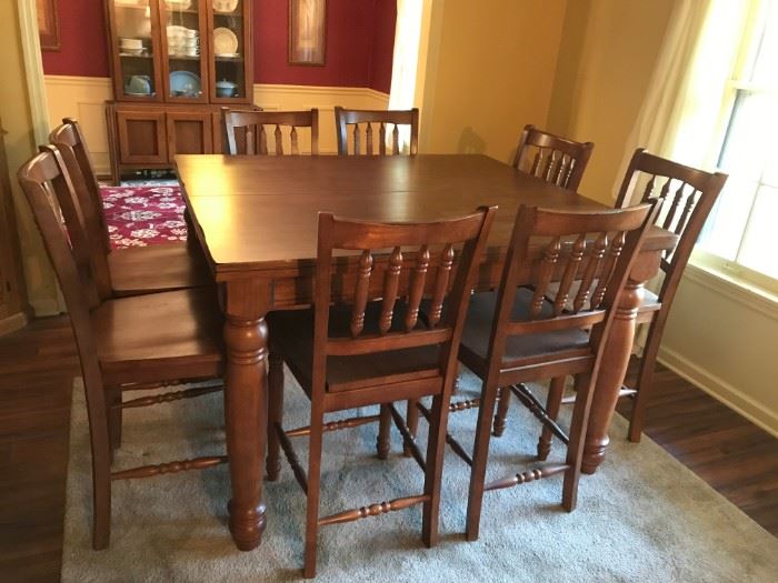 #1 tall table with 8 chairs and built in leaf 48-60x48x36 350.00