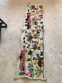 #65 vintage wall hanging with embroidery on it 25.00