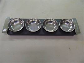 Wolfgang Puck yes its Puck condiment server ne ...