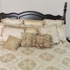 Nearly new bedding with bed skirt and many pillows and shams. Owner paid nearly a $1,000 for it. We will have it for a fraction of the price. 