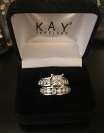 Kay Jewelry wedding set: Band 14 k white gold - 1 karat weight band 
Ring - 90 points
4 princess cut diamonds in the center 
