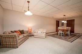 loveseat matches prior L-shaped sofa. Can be sold separately. Leather chair.