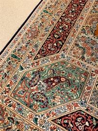 closeup of large rug in dining area