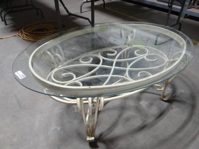 Metal frame coffee table w glass top.