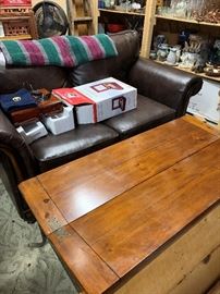 The loveseat and coffee table.