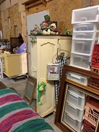 There are also bunches of storage pieces.  The yellow desk in back is a sewing desk, and the cabinet in front is a tv cabinet.