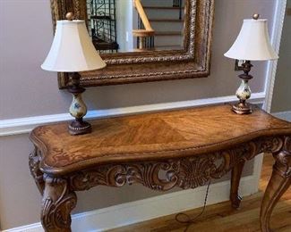 Great heavily carved, inlayed table. Use as sofa, entry, or console table.