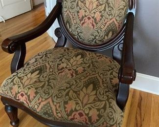Pretty upholstered arm chair.