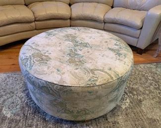 Large round ottoman.