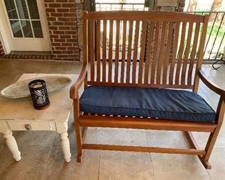 Indoor/outdoor loveseat rocker. Your porch needs this!