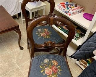 Needlepoint chairs.