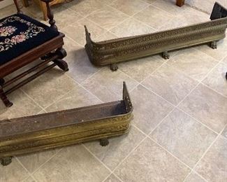 Antique brass fireplace guards.