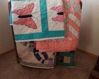 Quilt Stand and Homemade Quilts
