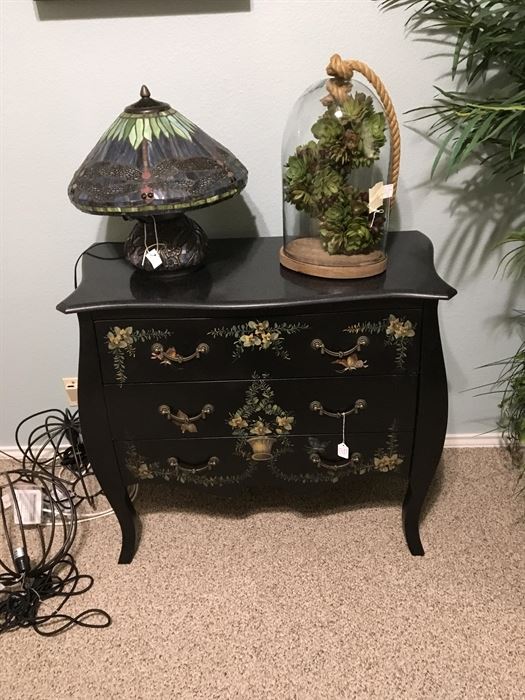 Bombay chest is sold, but the lamp and succulents under the dome are still available!