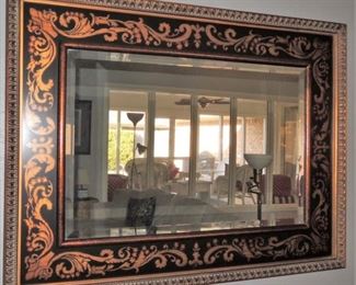 large black and gold stenciled frame mirror