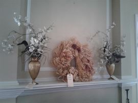 Brass urns and wreath