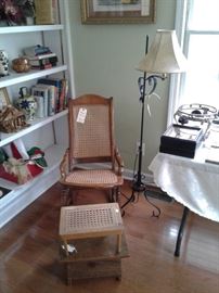 Caned walnut rocker and 1 cane topped foot stool and pine foot stool
