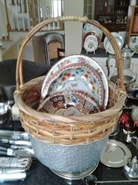 Metal & woven basket with a collection of Daher wares inside