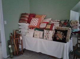 Tons and tons of throw pillows including needlepoint, crewel, cross stitch, Pottery Barn, etc.