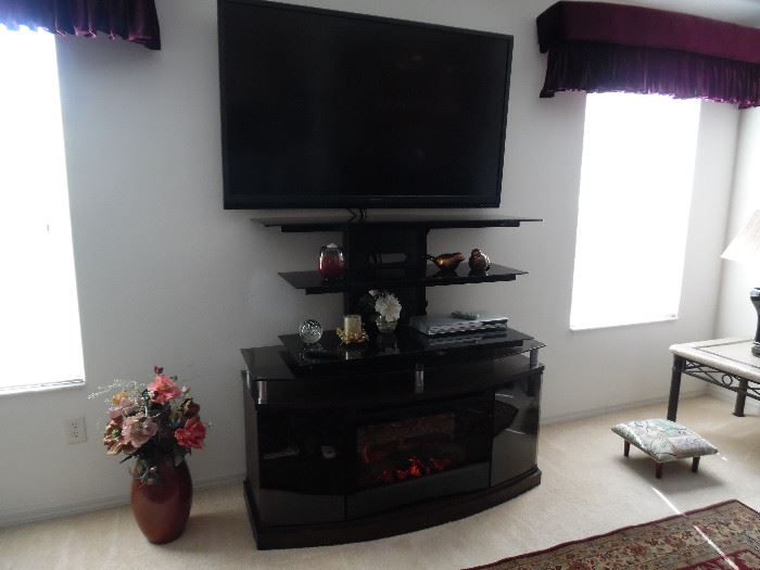 Dimplex fireplace and TV console (one piece) from Coral's Casual