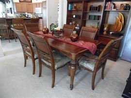 Dining table with 1 leaf, 2 captain's chairs, 4 side chairs