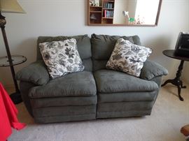 Grey micro fiber love seat, reclining ends
