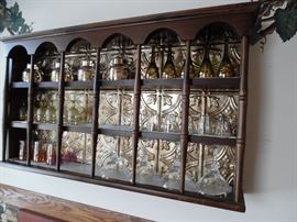 Wall rack with metal tile back