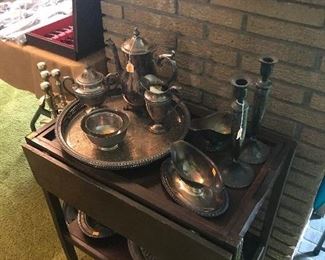 Silverplate pieces on a teacart with drop down sides!