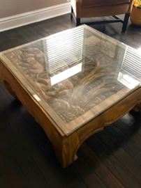 Carved wood coffee table with elephants 